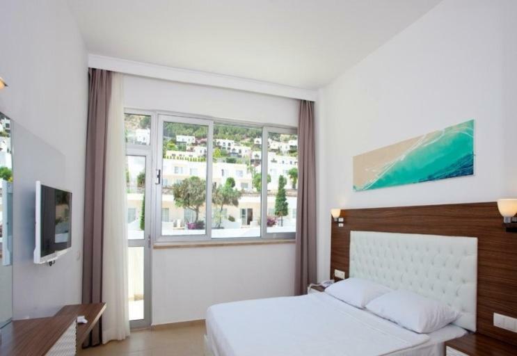 Cocos The Club Hotel Ortakent Bagian luar foto